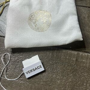 Versace White and Gold Drawstring Pouch